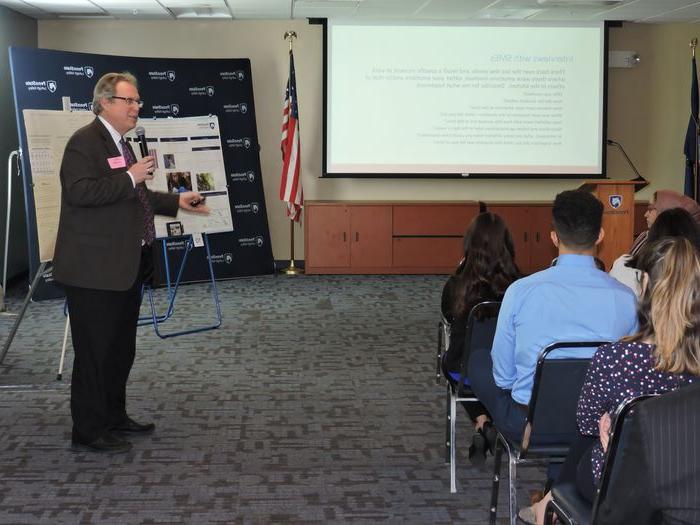 professor presenting to group