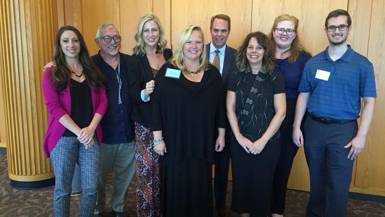 group from PSU-LV pose with keynote speaker